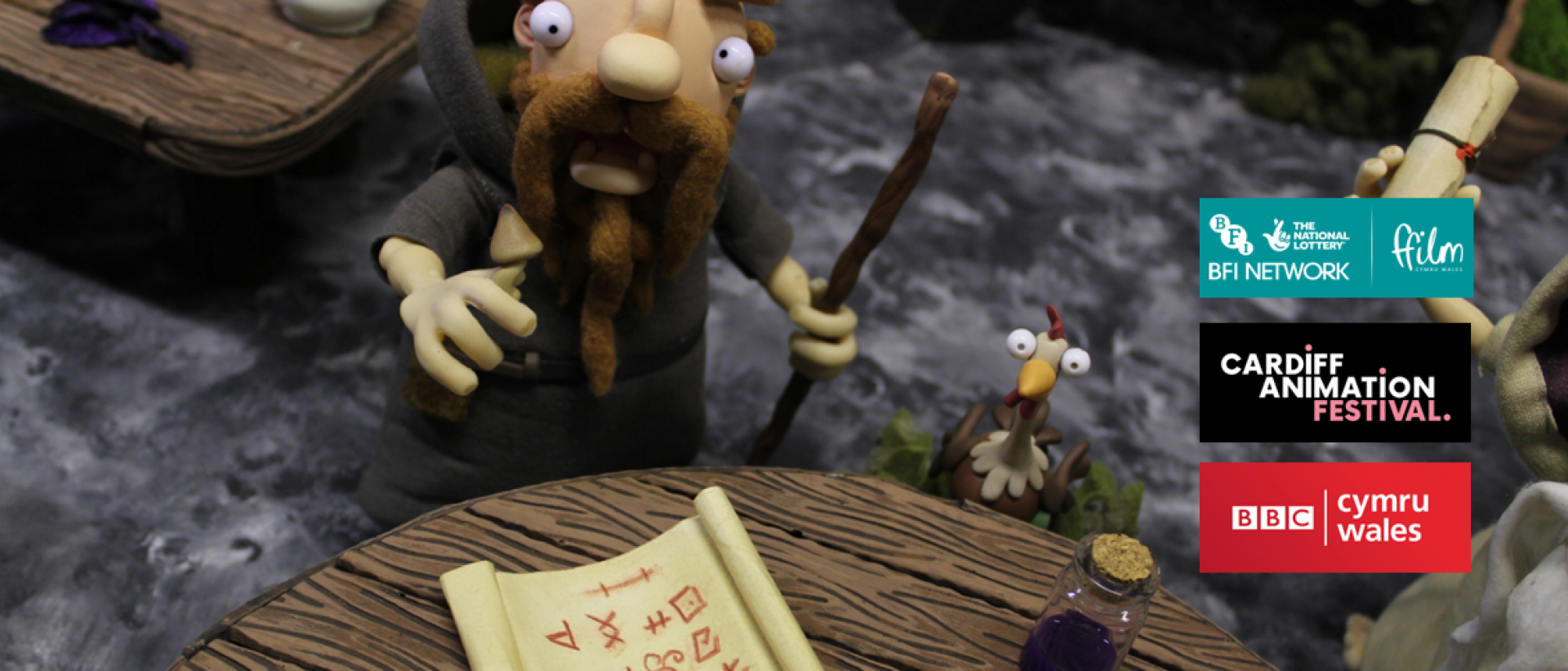a still from animated short film druids, featyuring a clay puppet of a druid with a walking stick