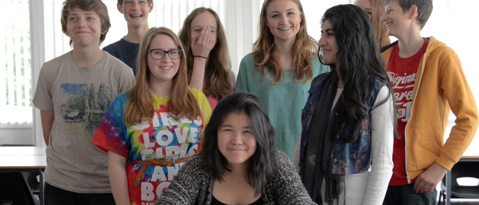 a group of young people pose for a photo as part of an iris prize film education project