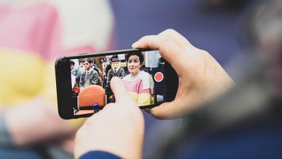 Young people making their own films on a smartphone