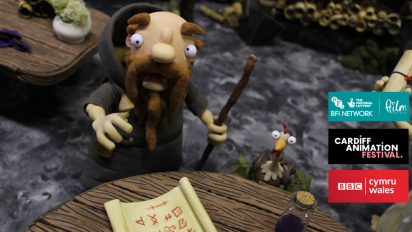 a still from animated short film druids, featyuring a clay puppet of a druid with a walking stick