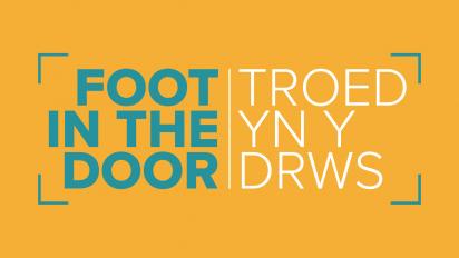 foot in the door logo in teal and white on a golden yellow background