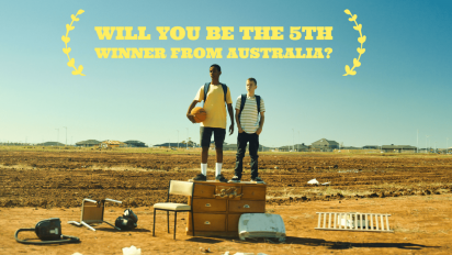 two teenagers standing on an old chest of drawers in a field. Text over the top reads Will you be the 5th winner from Australia?